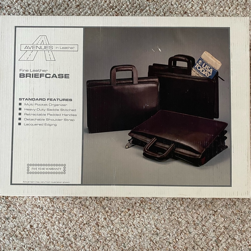 Rarely used, almost new Burgundy color leather briefcase with 7 compartments